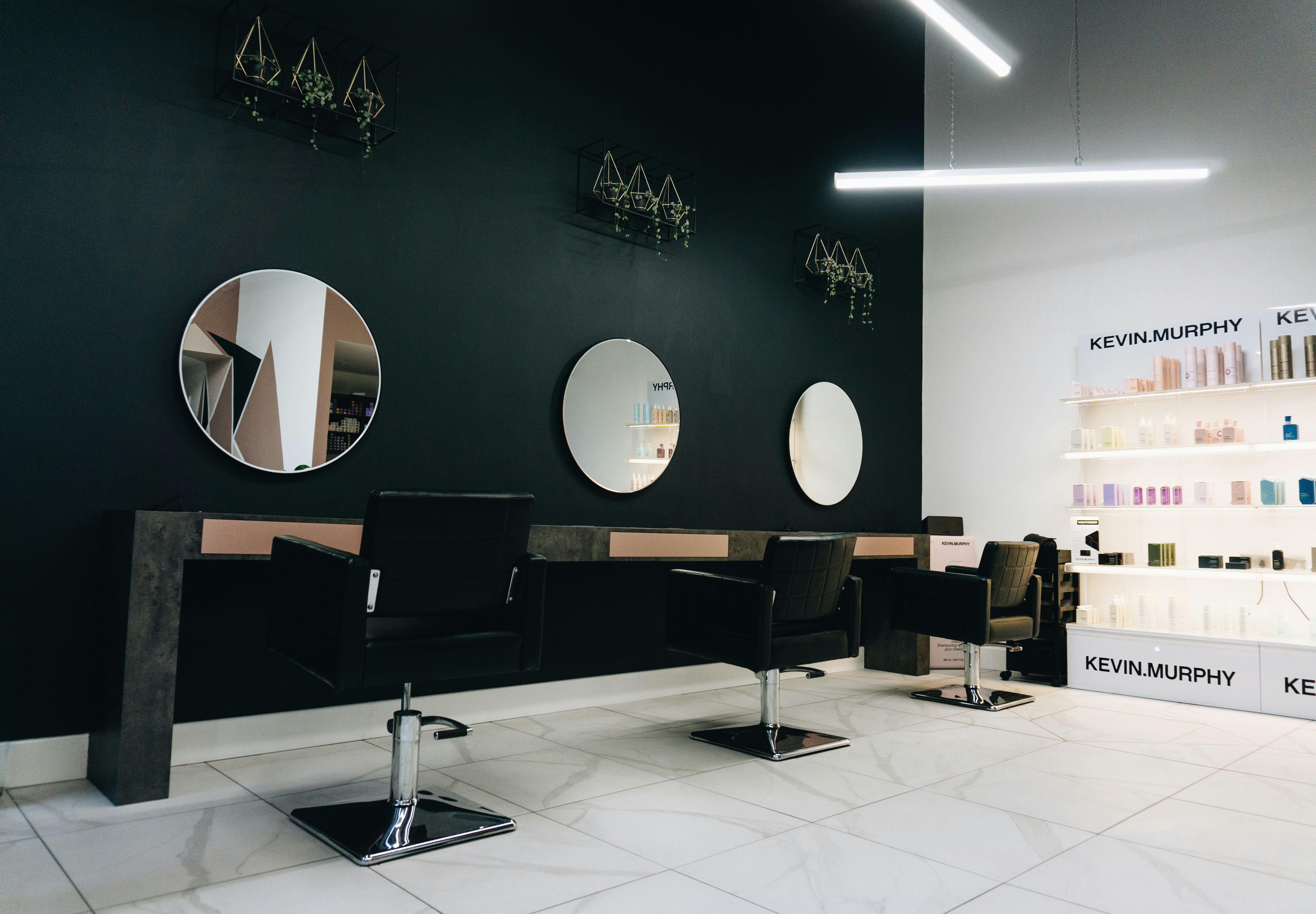 Inside the Strand & Co. studio — chairs, mirrors, natural light